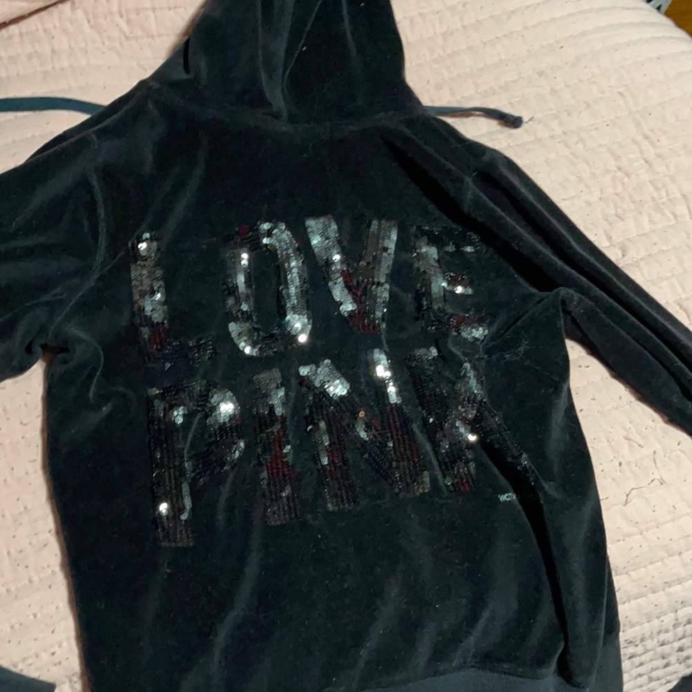Pink velour jacket in black size small.